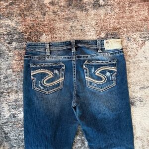 Silver Jeans Women's Boot Cut Distressed Denim